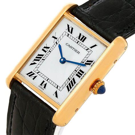 men's gold cartier tank watch.